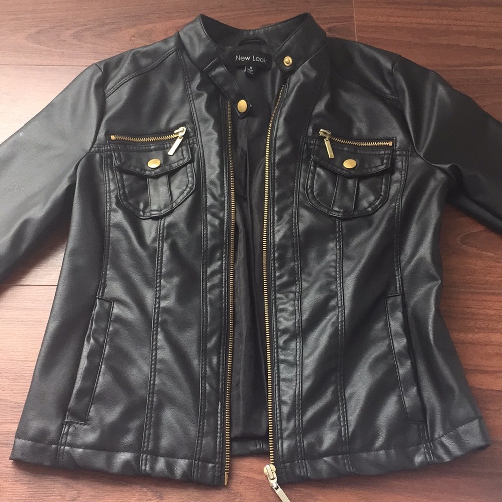 Black leather jacket with gold zippers